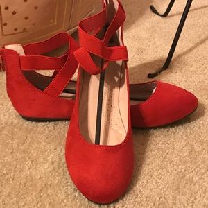 Red ballerina flats